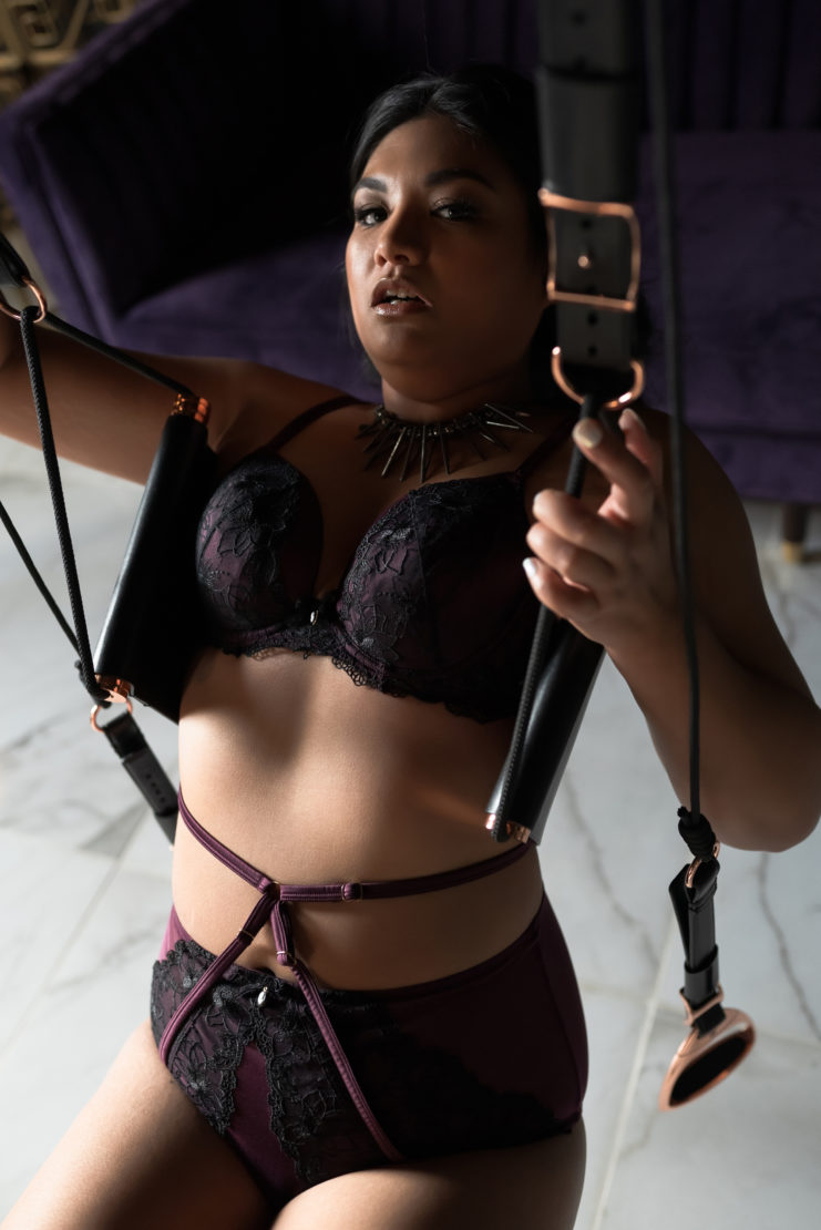 Ms F poses in our downtown Norfolk, Virginia Boudoir Studio during her boudoir session with LeZandra Photography. 
